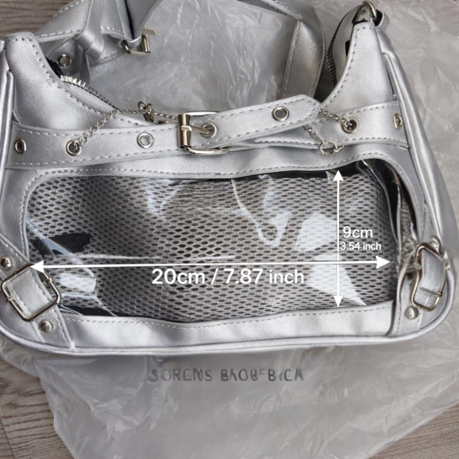 Black Convertible Ita Bag with Clear Window for Photocards and Pins Black Convertible Ita Bag with Clear Window for Photocards and Pins — ita bag detail view
