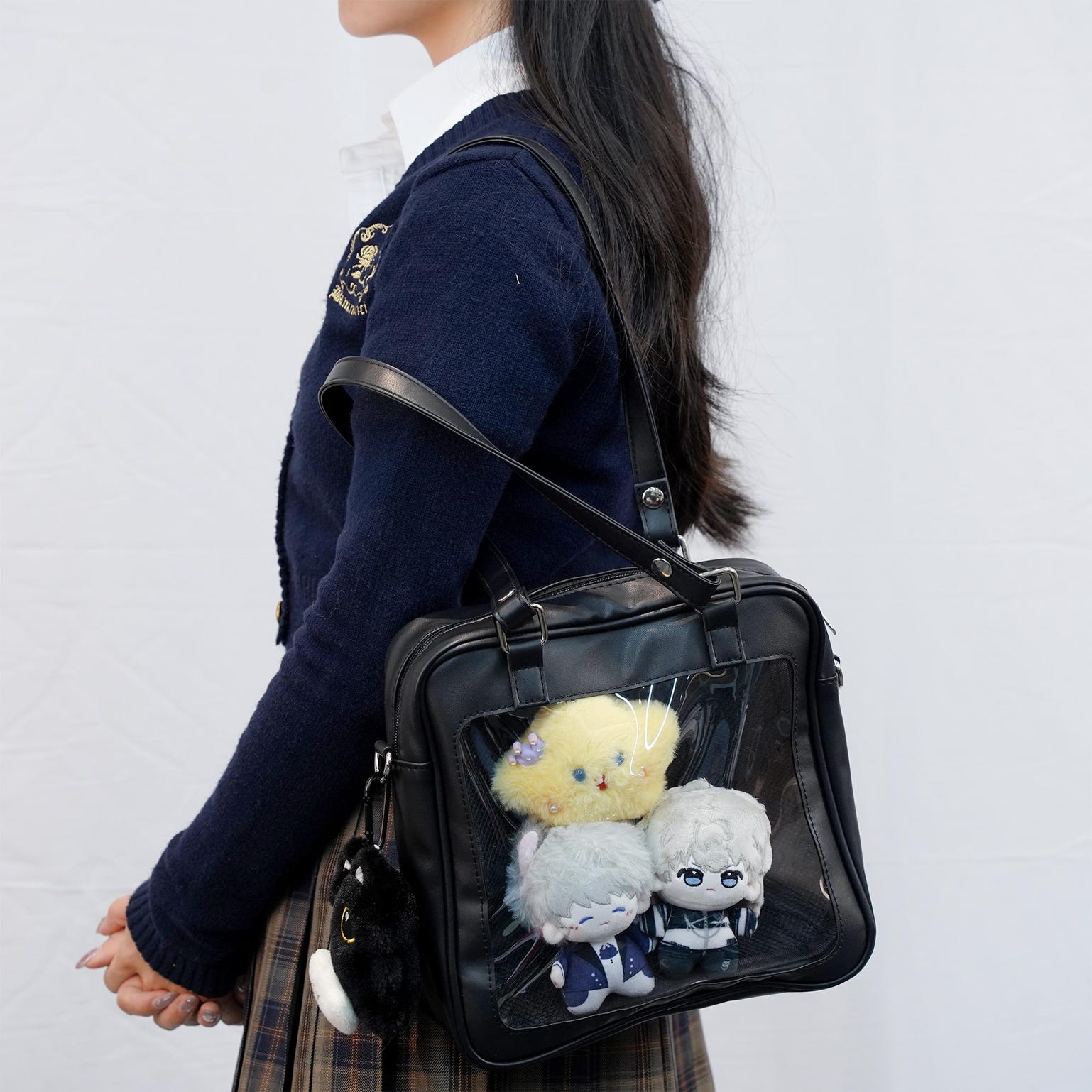 Black Convertible Ita Bag with Clear Window for Pin Display Black Convertible Ita Bag with Clear Window for Pin Display — ita bag detail view