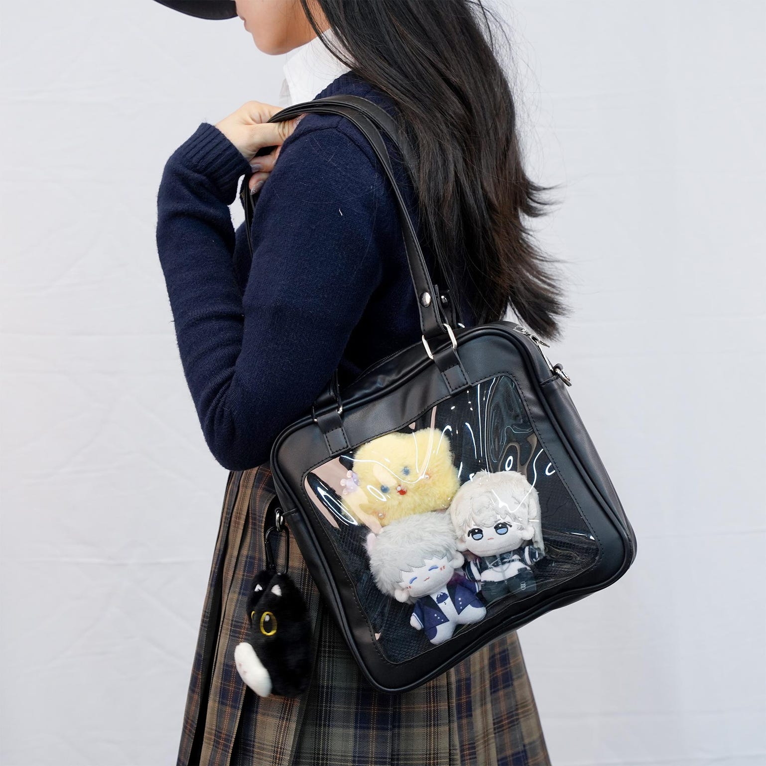 Black Convertible Ita Bag with Clear Window for Pin Display Black Convertible Ita Bag with Clear Window for Pin Display — ita bag detail view