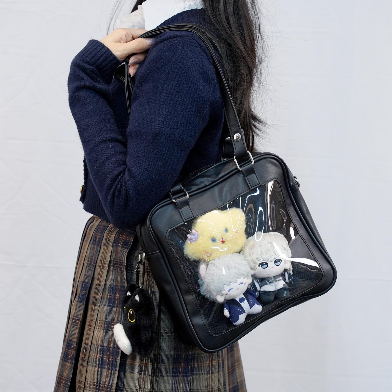 Black Convertible Ita Bag with Clear Window for Pin Display Black Convertible Ita Bag with Clear Window for Pin Display — ita bag detail view