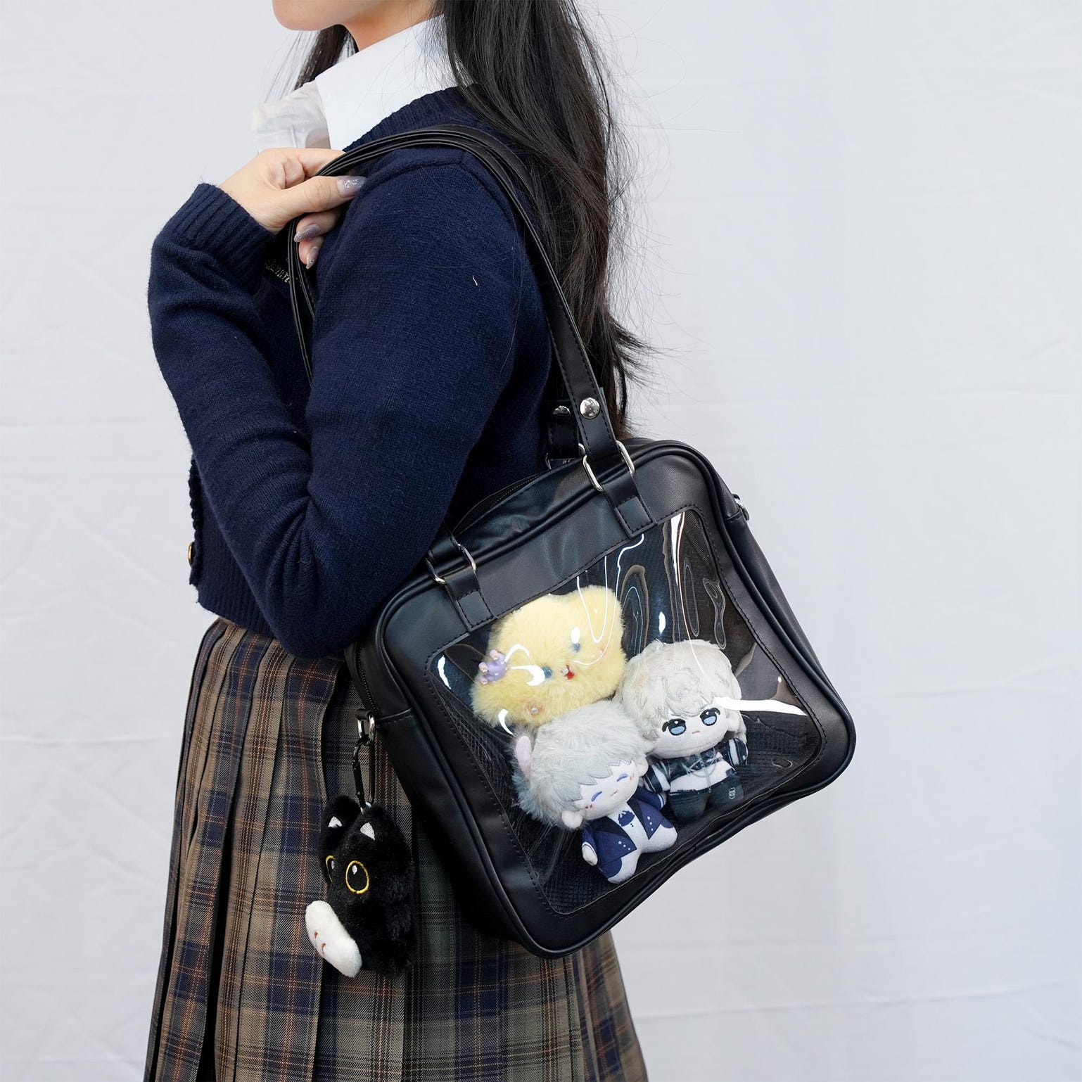 Black Convertible Ita Bag with Clear Window for Pin Display Black Convertible Ita Bag with Clear Window for Pin Display — ita bag detail view