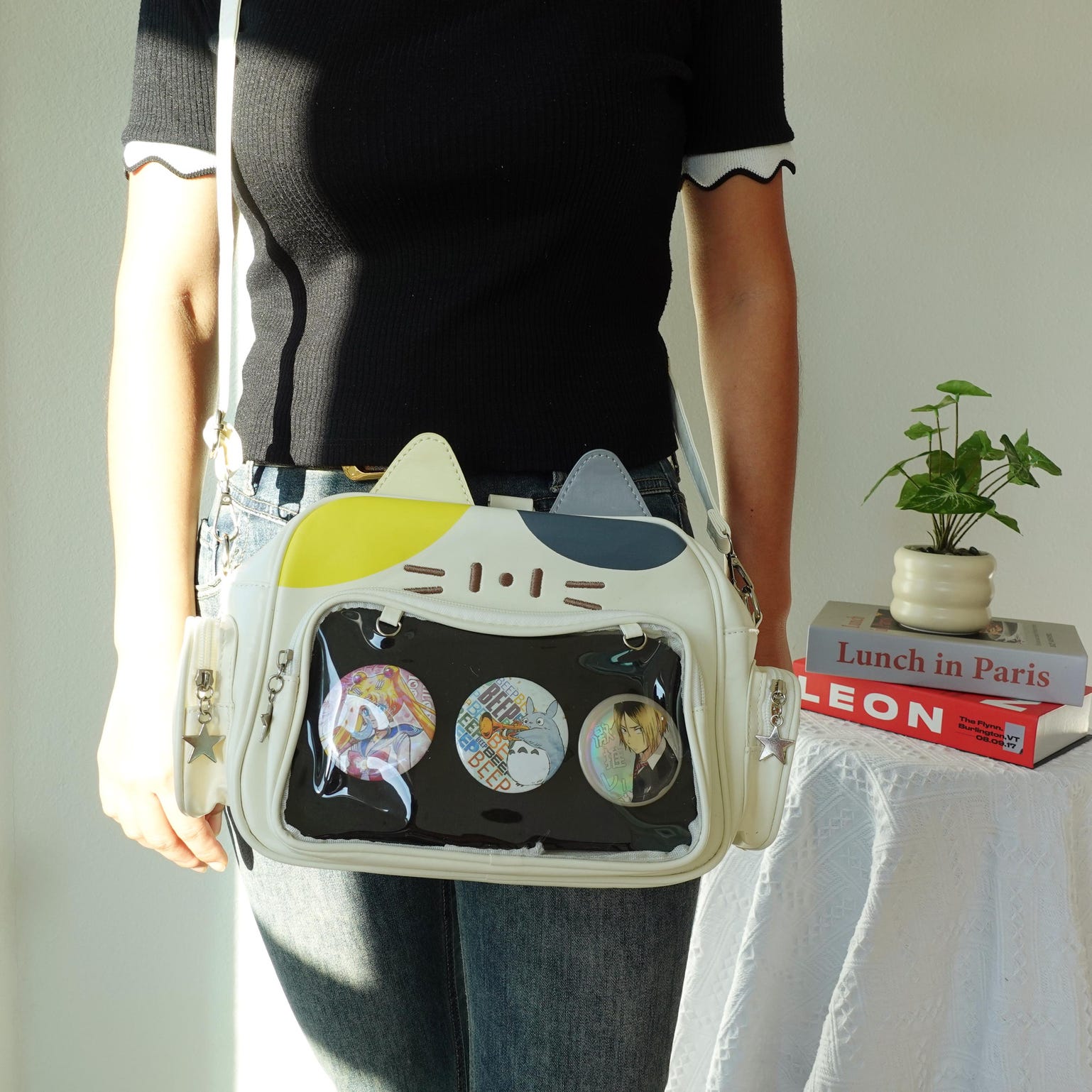 Black Kawaii Cat Convertible Ita Bag with Clear Window for Pin Display Black Kawaii Cat Convertible Ita Bag with Clear Window for Pin Display — ita bag detail view