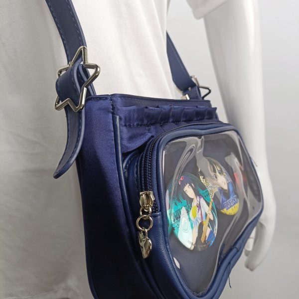 Blue Ita Crossbody Bag with Clear Window and Included Insert for Pin Display — crossbody ita bag detail view