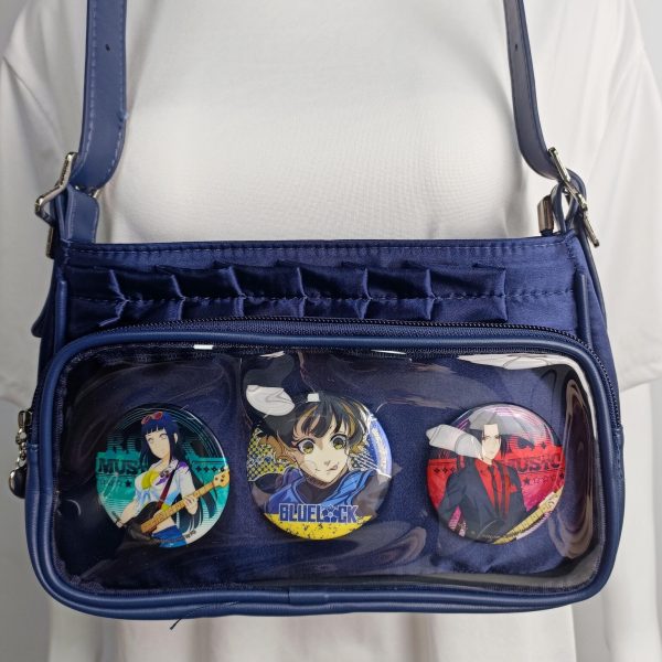 Blue Ita Crossbody Bag with Clear Window and Included Insert for Pin Display — crossbody ita bag detail view