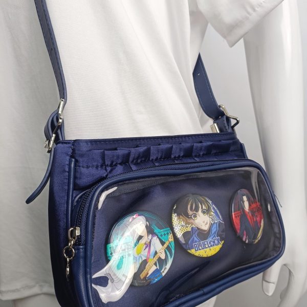 Blue Ita Crossbody Bag with Clear Window and Included Insert for Pin Display — crossbody ita bag detail view