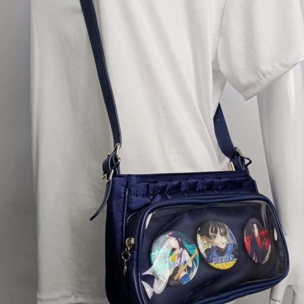 Blue Ita Crossbody Bag with Clear Window and Included Insert for Pin Display — crossbody ita bag detail view