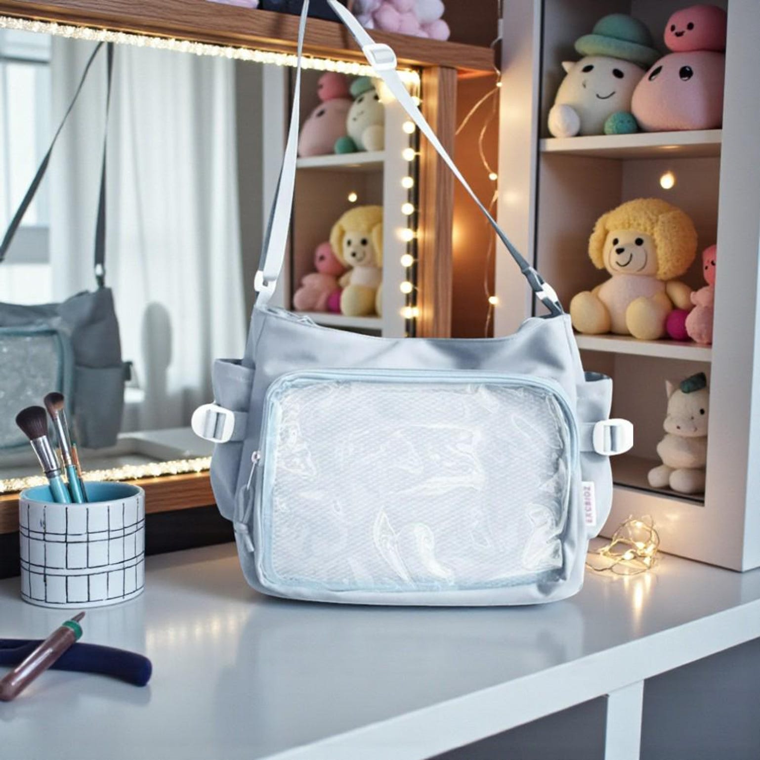 Blue Kawaii Convertible Ita Bag with Clear Window for Pin Display Blue Kawaii Convertible Ita Bag with Clear Window for Pin Display — ita bag detail view