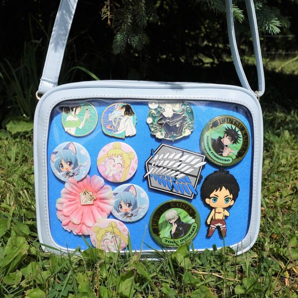 Gold Ita Crossbody Bag with Clear Window and Included Insert for Pin Display — crossbody ita bag detail view