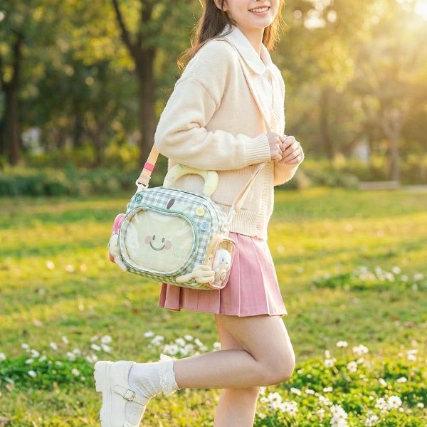 Green Apple Ita Backpack with Clear Window and Included Insert for Plushies and Pins — ita backpack detail view