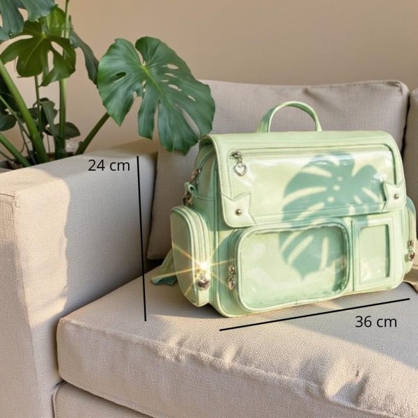 Green Kawaii Convertible Ita Bag with Clear Window for Pin Display — ita bag detail view