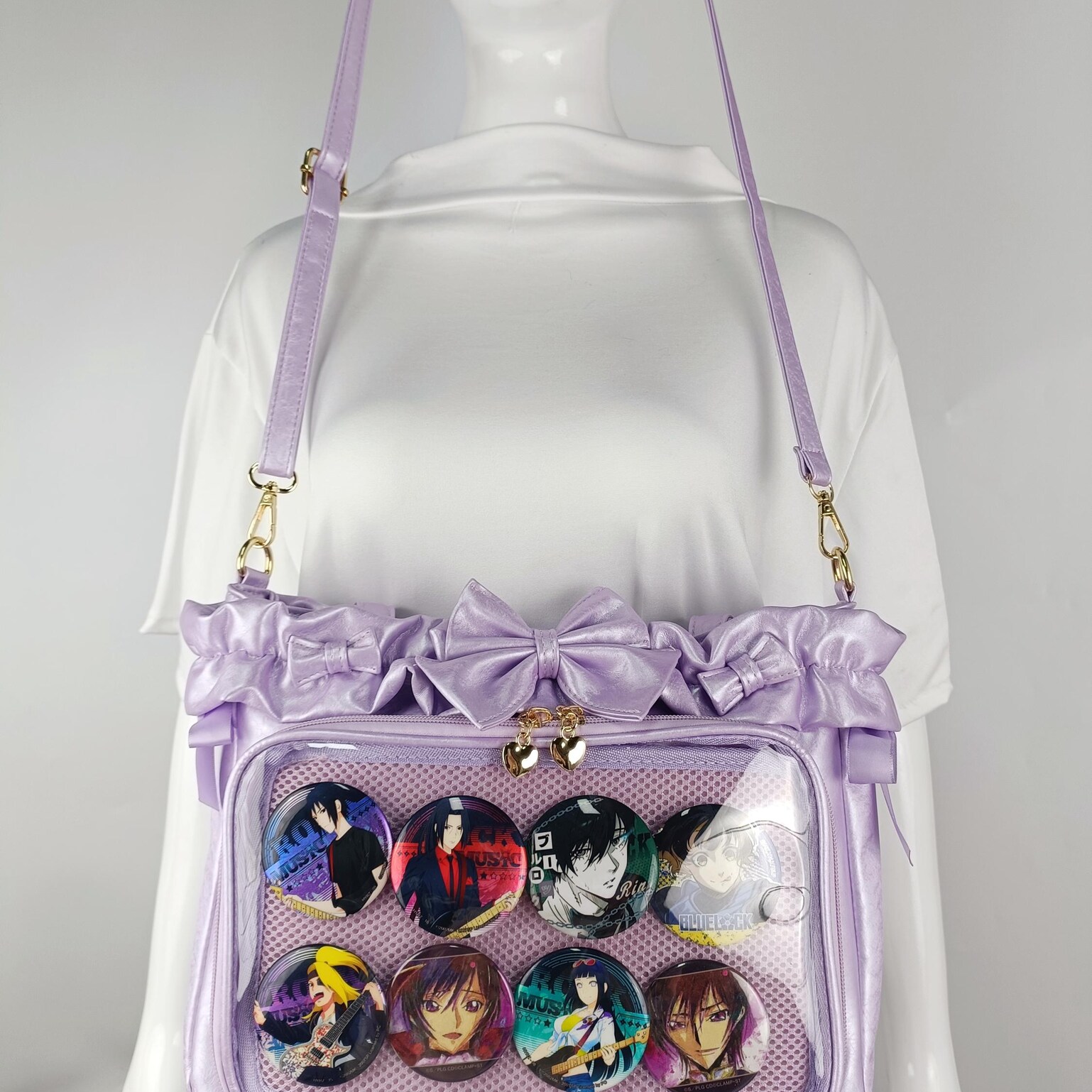 Green Ribbon Ita Crossbody Bag with Clear Window and Included Insert for Pin Display Green Ribbon Ita Crossbody Bag with Clear Window and Included Insert for Pin Display — crossbody ita bag detail view