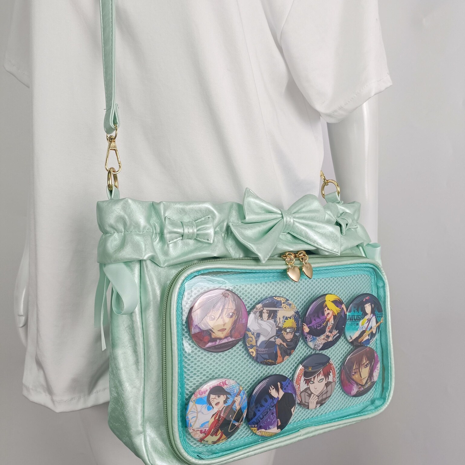 Green Ribbon Ita Crossbody Bag with Clear Window and Included Insert for Pin Display Green Ribbon Ita Crossbody Bag with Clear Window and Included Insert for Pin Display — crossbody ita bag detail view