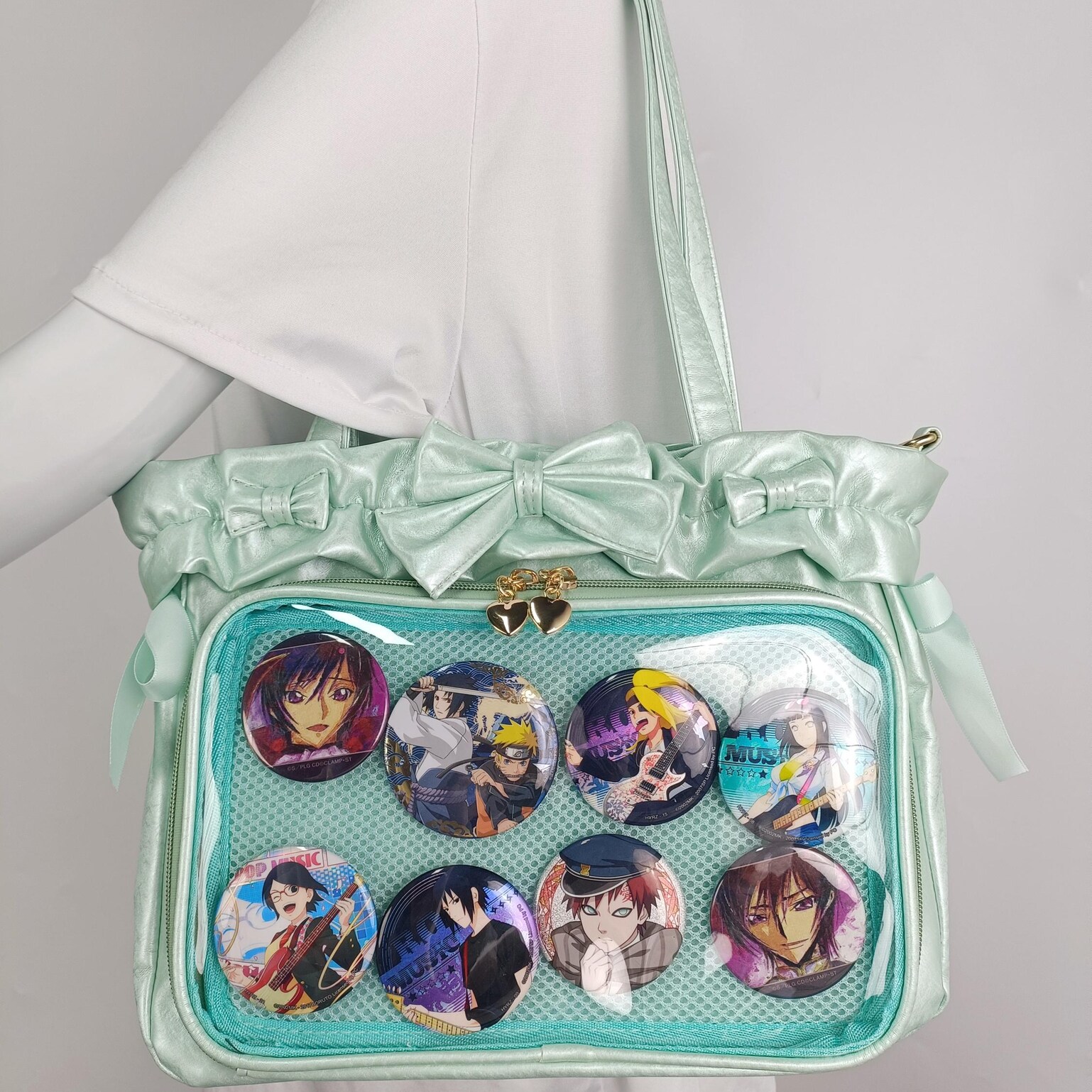 Green Ribbon Ita Crossbody Bag with Clear Window and Included Insert for Pin Display Green Ribbon Ita Crossbody Bag with Clear Window and Included Insert for Pin Display — crossbody ita bag detail view