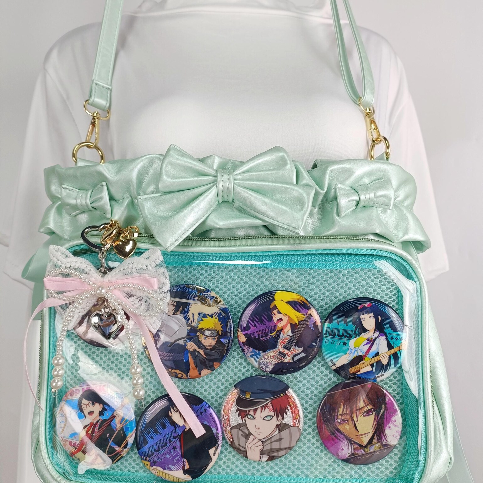 Green Ribbon Ita Crossbody Bag with Clear Window and Included Insert for Pin Display Green Ribbon Ita Crossbody Bag with Clear Window and Included Insert for Pin Display — crossbody ita bag detail view