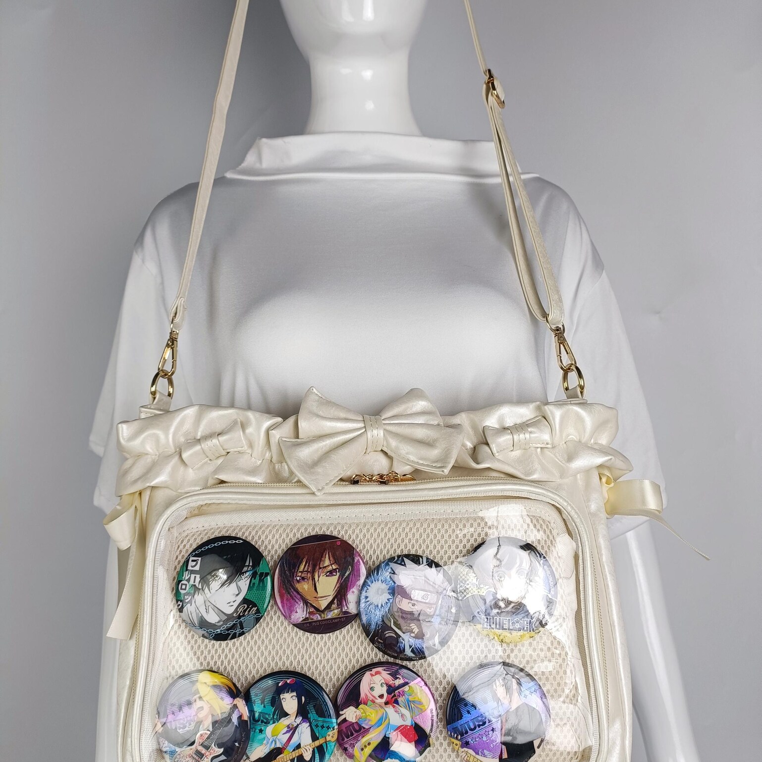 Green Ribbon Ita Crossbody Bag with Clear Window and Included Insert for Pin Display Green Ribbon Ita Crossbody Bag with Clear Window and Included Insert for Pin Display — crossbody ita bag detail view