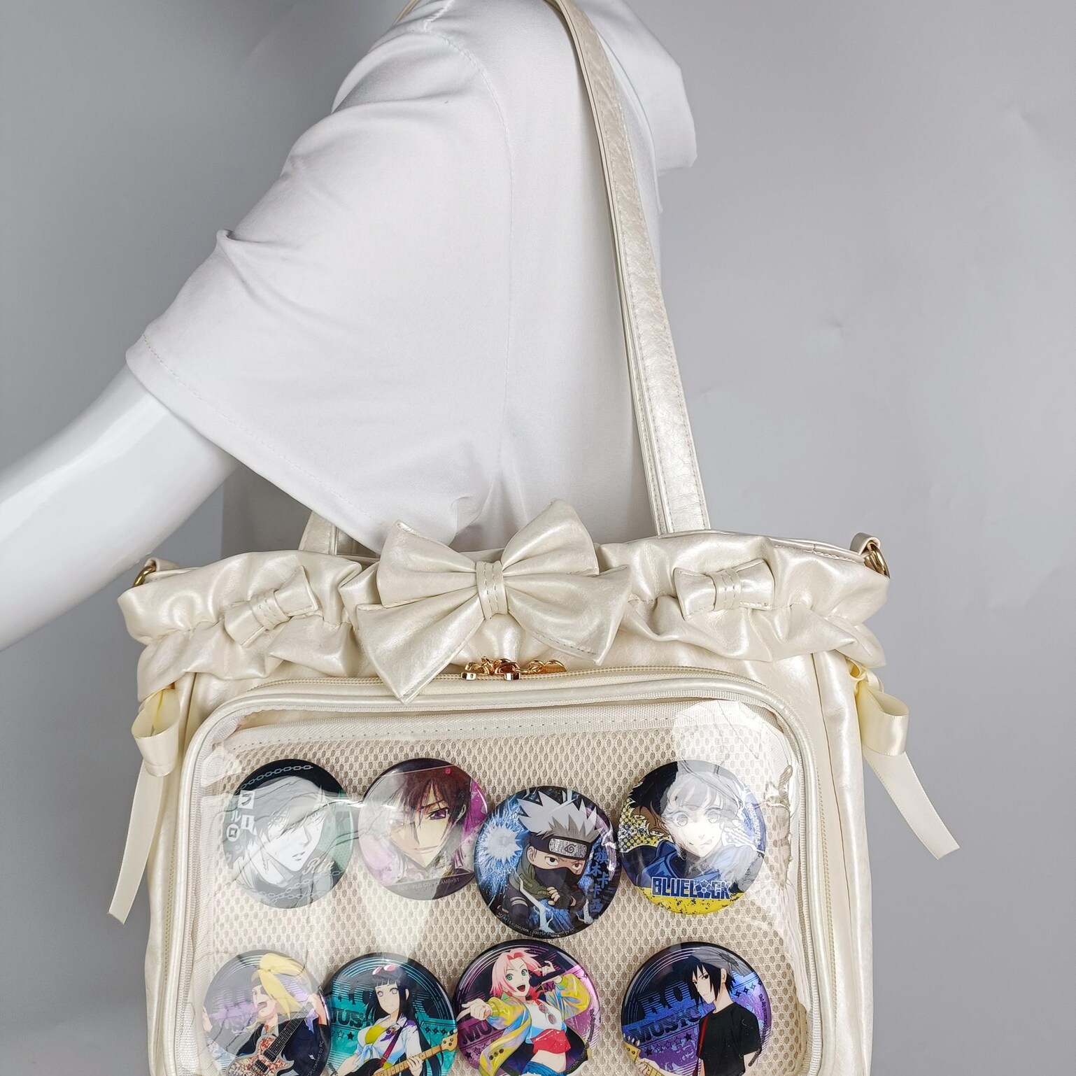 Green Ribbon Ita Crossbody Bag with Clear Window and Included Insert for Pin Display Green Ribbon Ita Crossbody Bag with Clear Window and Included Insert for Pin Display — crossbody ita bag detail view
