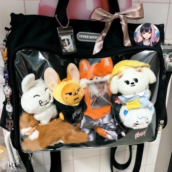Large Black Convertible Ita Bag with Clear Window for Plushies and Pins — ita bag detail view