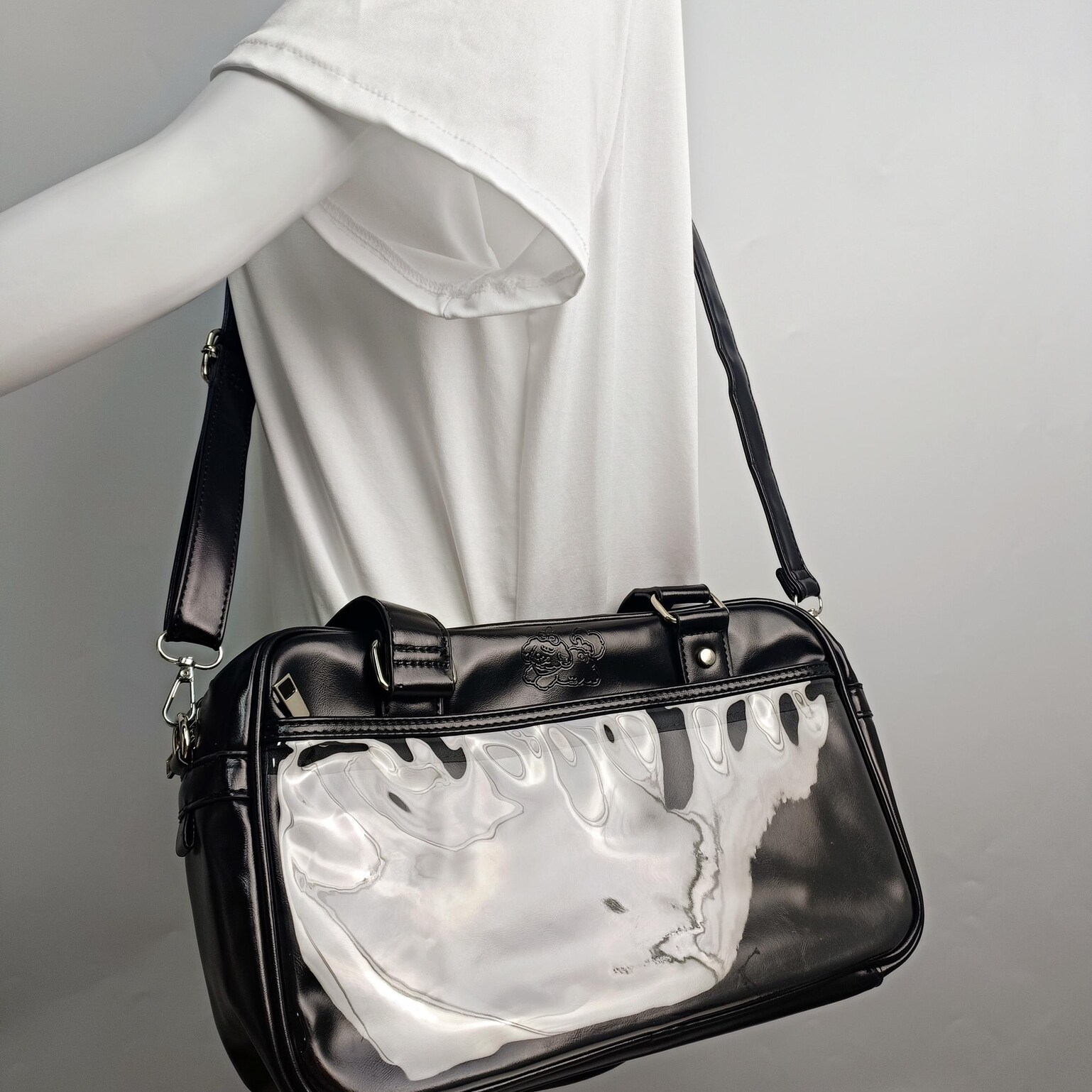 Large Black Ita Crossbody Bag with Clear Window for Pin Display Large Black Ita Crossbody Bag with Clear Window for Pin Display — crossbody ita bag detail view