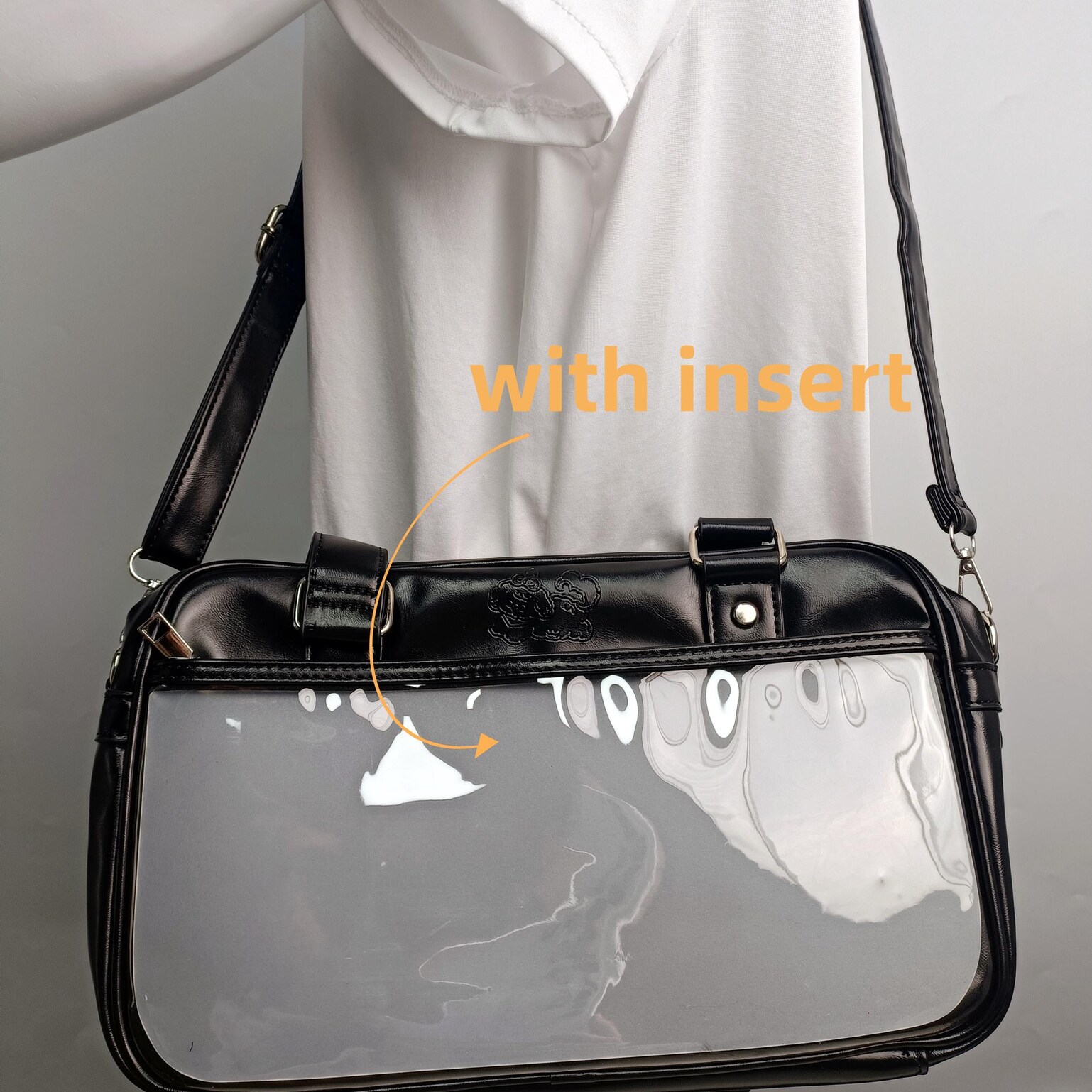 Large Black Ita Crossbody Bag with Clear Window for Pin Display Large Black Ita Crossbody Bag with Clear Window for Pin Display — crossbody ita bag detail view