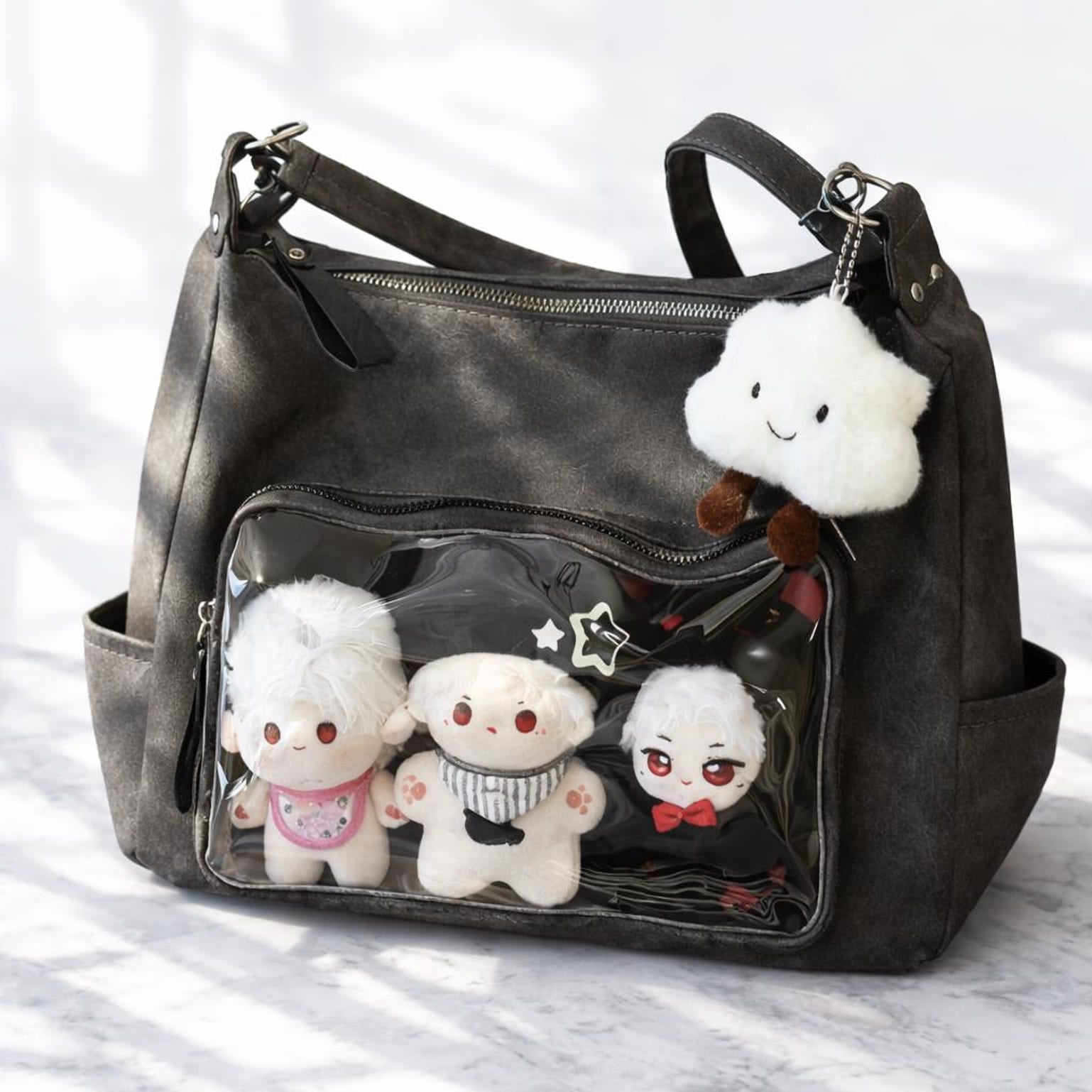 Large Black Ita Messenger Bag with Clear Window for Plushies and Pins Large Black Ita Messenger Bag with Clear Window for Plushies and Pins — ita bag detail view