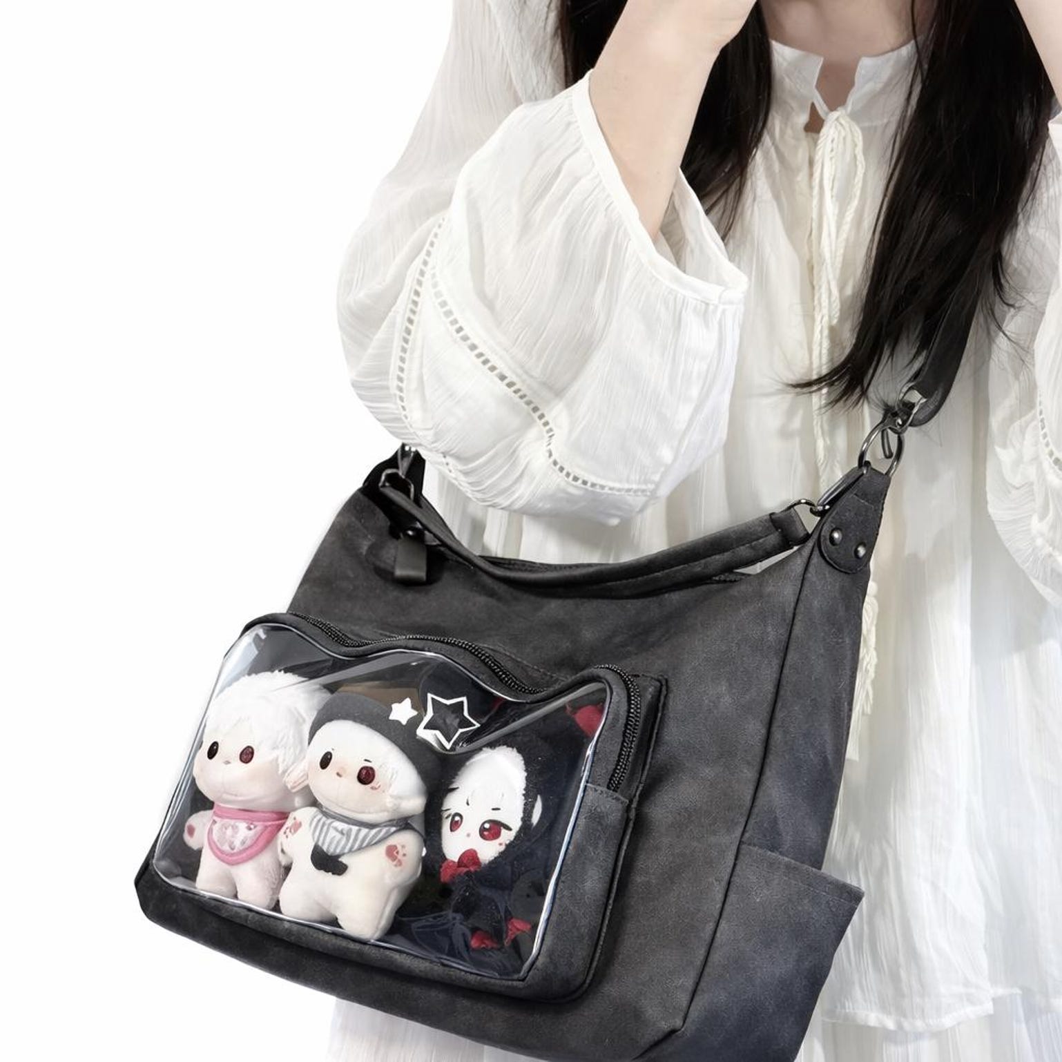 Large Black Ita Messenger Bag with Clear Window for Plushies and Pins Large Black Ita Messenger Bag with Clear Window for Plushies and Pins — ita bag detail view