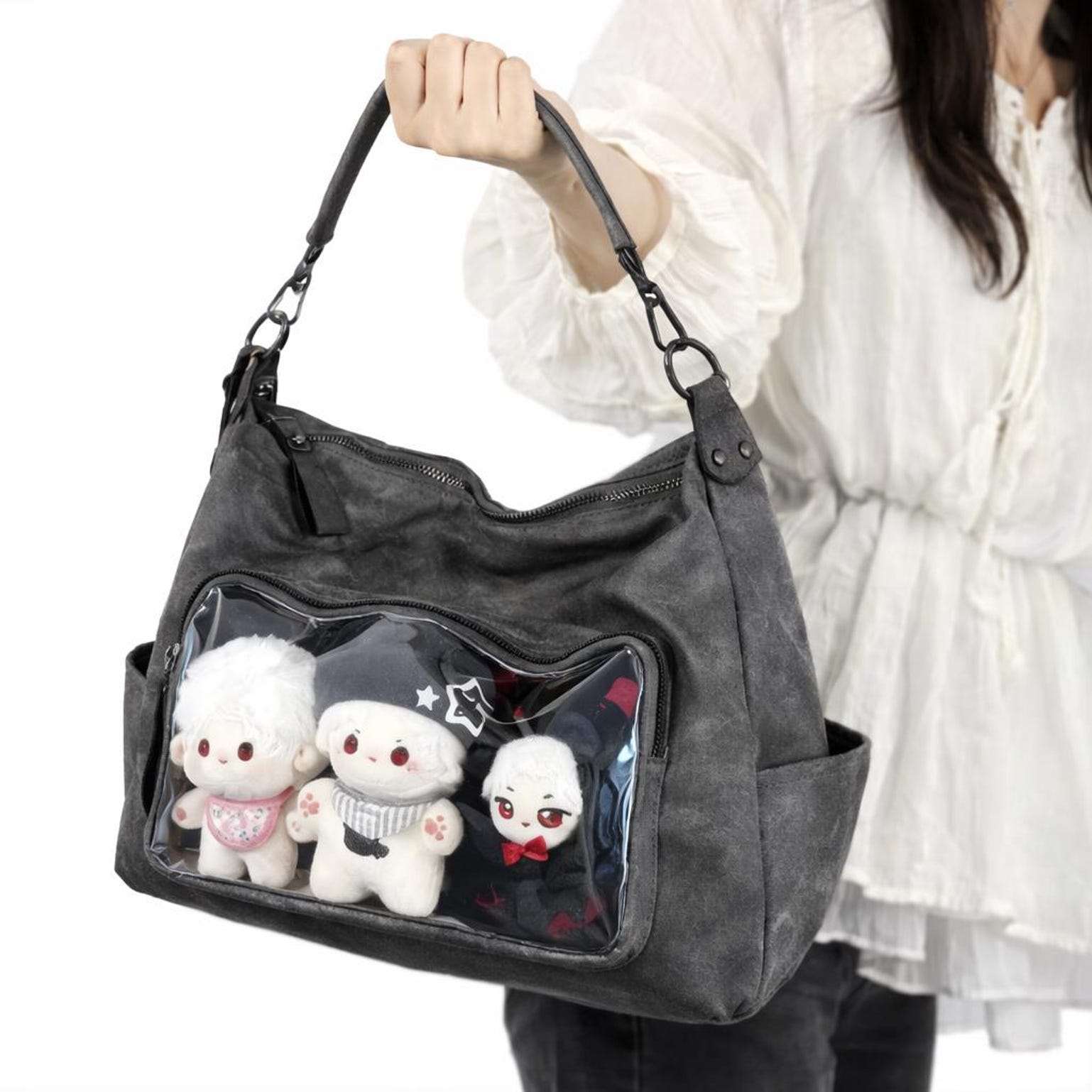Large Black Ita Messenger Bag with Clear Window for Plushies and Pins Large Black Ita Messenger Bag with Clear Window for Plushies and Pins — ita bag detail view