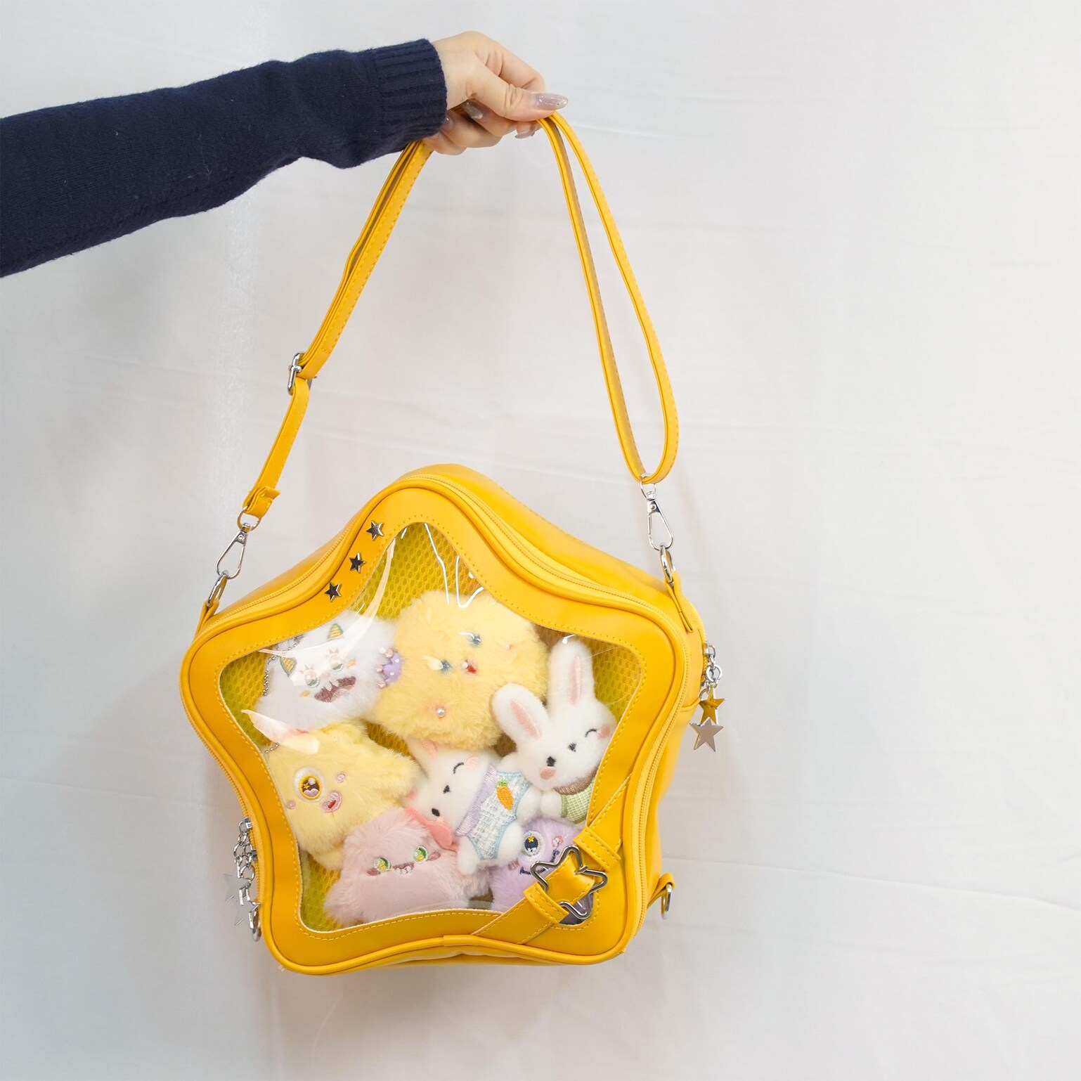 Large Black Star Convertible Ita Bag with Clear Window for Pin Display Large Black Star Convertible Ita Bag with Clear Window for Pin Display — ita bag detail view