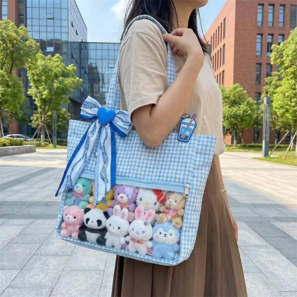 Large Blue Ita Messenger Bag with Clear Window for Pin Display — ita bag detail view
