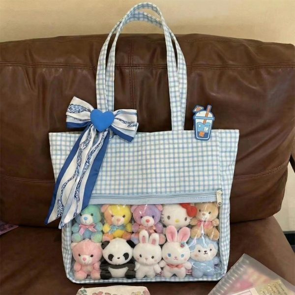 Large Blue Ita Messenger Bag with Clear Window for Pin Display — ita bag detail view