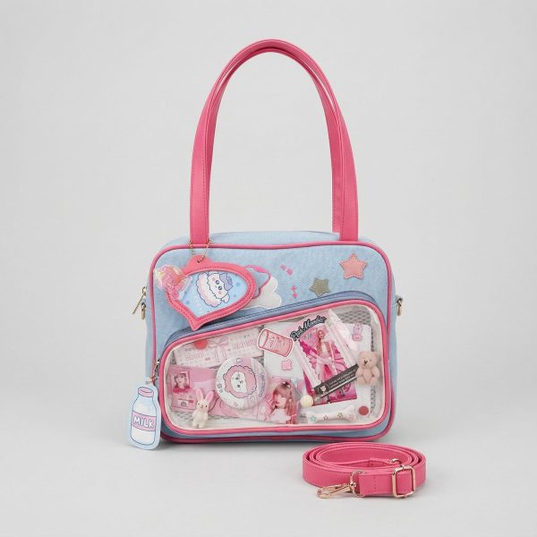 Large Pink Kawaii Y2K Convertible Ita Bag with Clear Window for Plushies and Pins — ita bag detail view