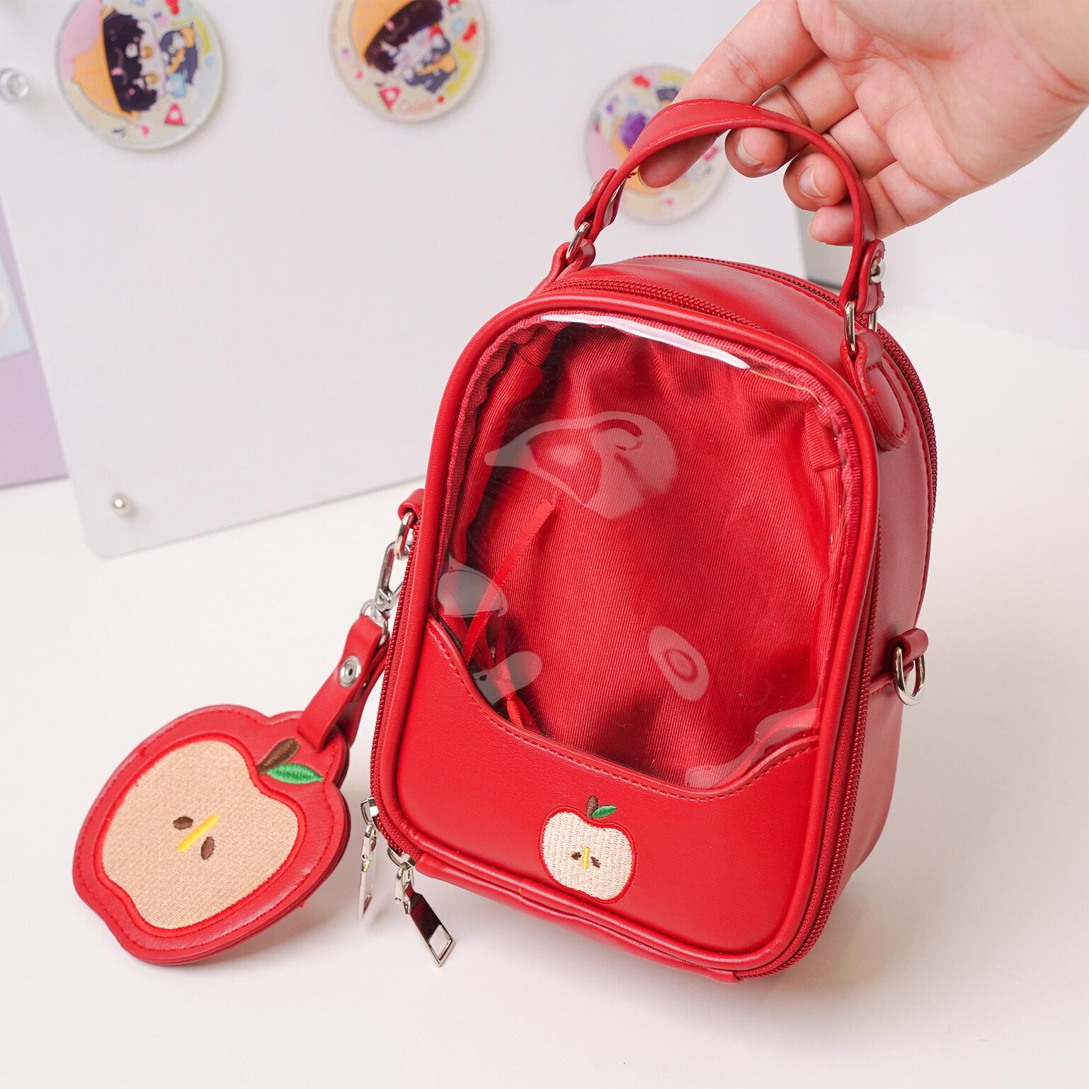 Mini Apple Ita Crossbody Bag with Clear Window for Pin Display Mini Apple Ita Crossbody Bag with Clear Window for Pin Display — crossbody ita bag detail view