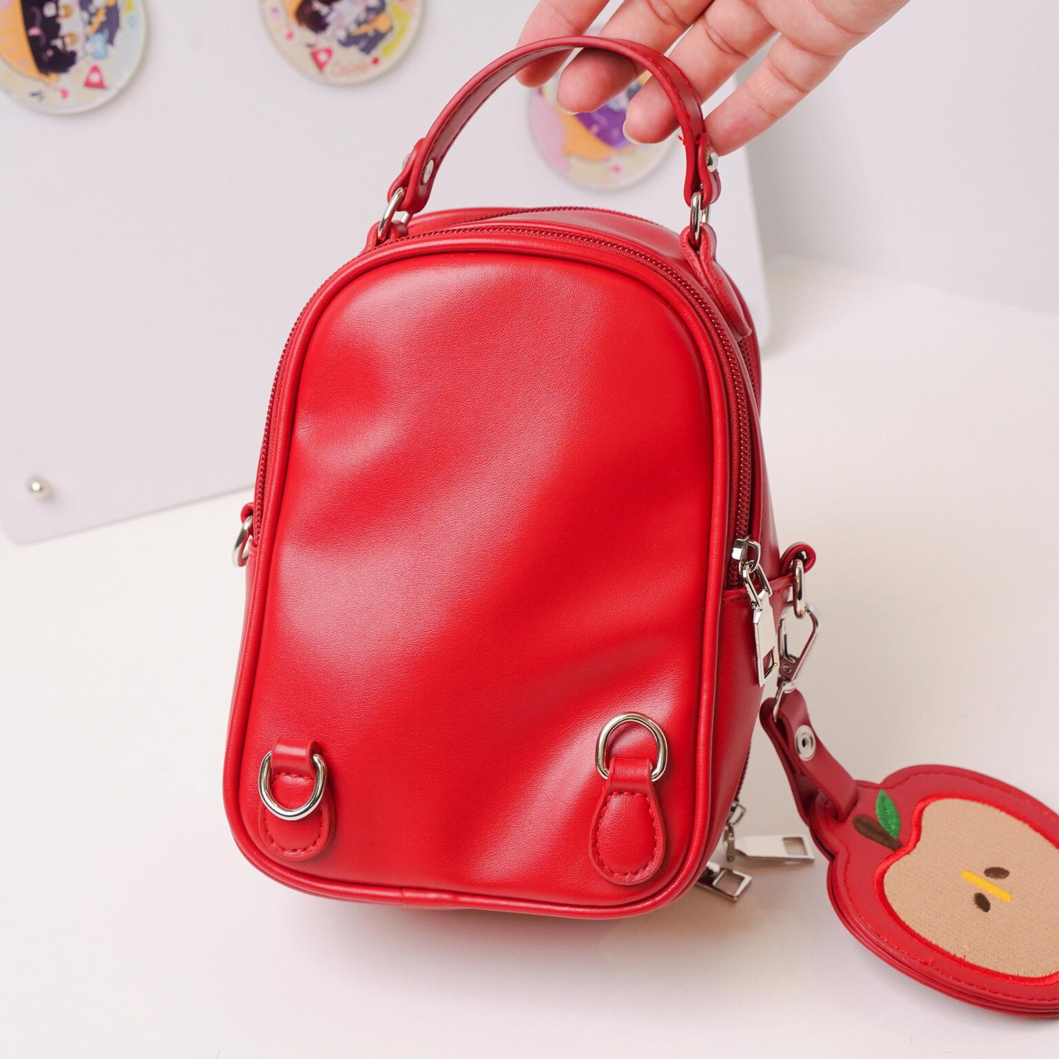 Mini Apple Ita Crossbody Bag with Clear Window for Pin Display Mini Apple Ita Crossbody Bag with Clear Window for Pin Display — crossbody ita bag detail view