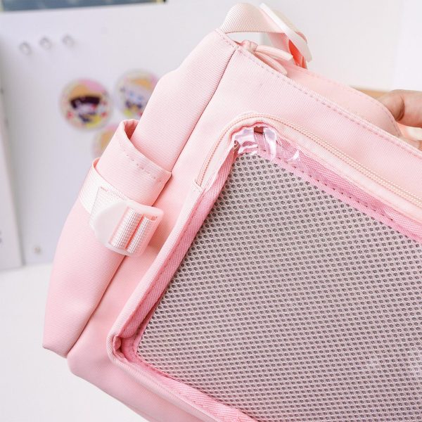 Pink Kawaii Convertible Ita Bag with Clear Window for Plushies and Pins — ita bag detail view