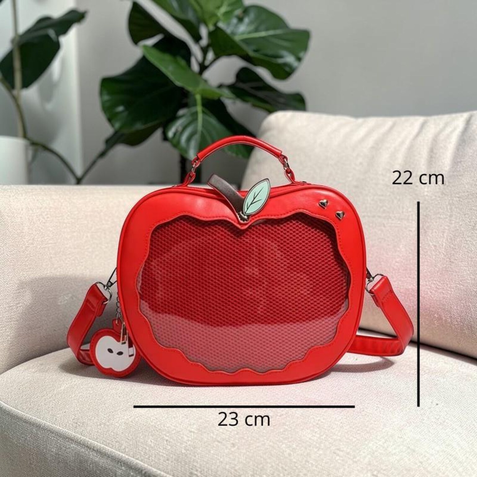 Red Apple Convertible Ita Bag with Clear Window for Pin Display Red Apple Convertible Ita Bag with Clear Window for Pin Display — ita bag detail view