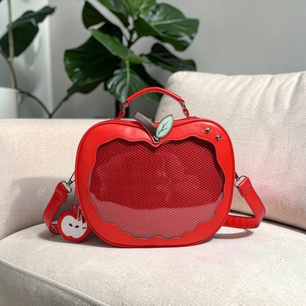 Red Apple Convertible Ita Bag with Clear Window for Pin Display — ita bag detail view