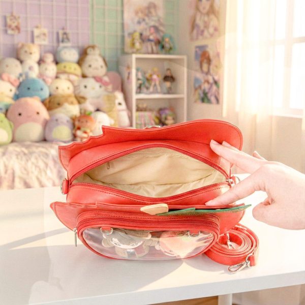 Red Apple Convertible Ita Bag with Clear Window for Plushies and Pins — ita bag detail view