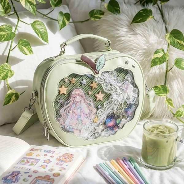 Red Apple Convertible Ita Bag with Clear Window for Plushies and Pins — ita bag detail view