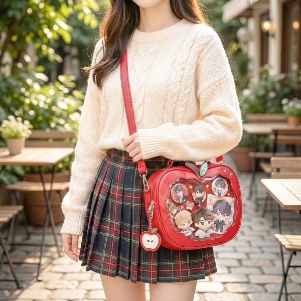 Red Apple Convertible Ita Bag with Clear Window for Plushies and Pins — ita bag detail view
