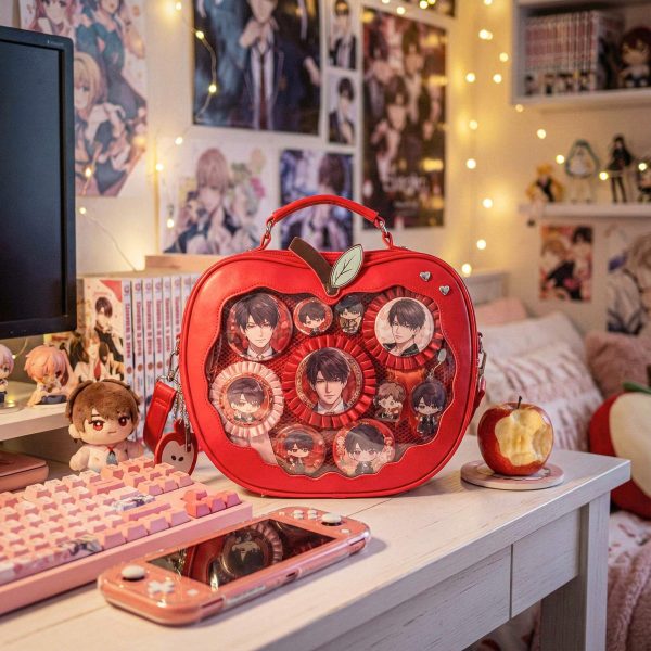 Red Apple Convertible Ita Bag with Clear Window for Plushies and Pins — ita bag detail view