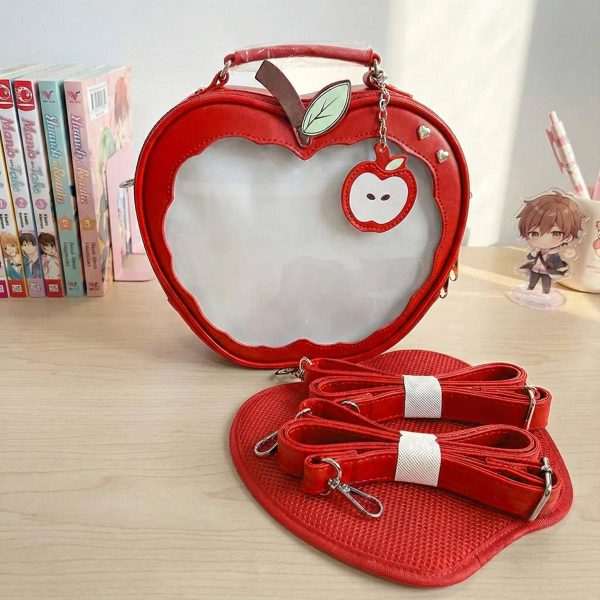 Red Apple Convertible Ita Bag with Clear Window for Plushies and Pins — ita bag detail view