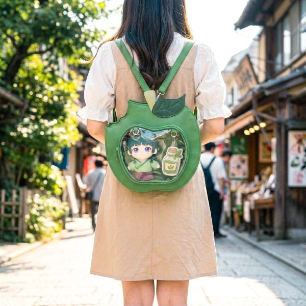 Red Apple Convertible Ita Bag with Clear Window for Plushies and Pins — ita bag detail view