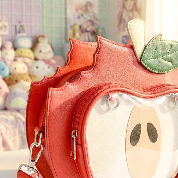 Red Apple Convertible Ita Bag with Clear Window for Plushies and Pins — ita bag detail view