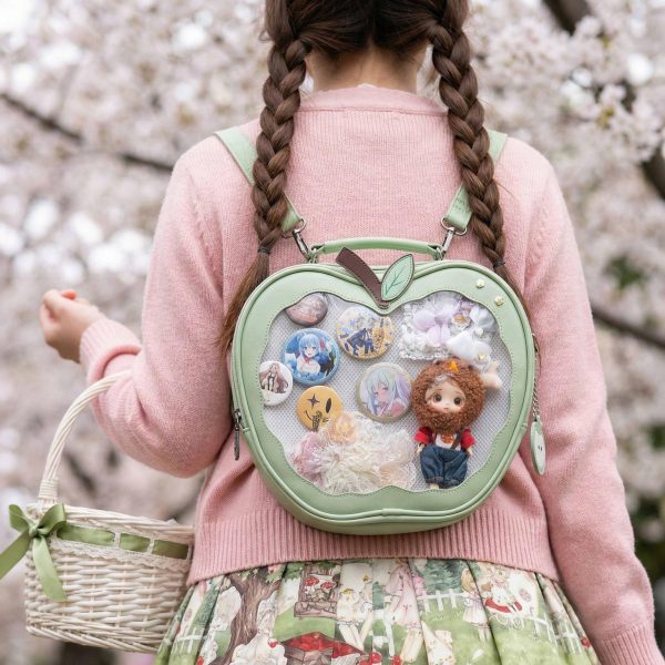 Red Apple Convertible Ita Bag with Clear Window for Plushies and Pins — ita bag detail view