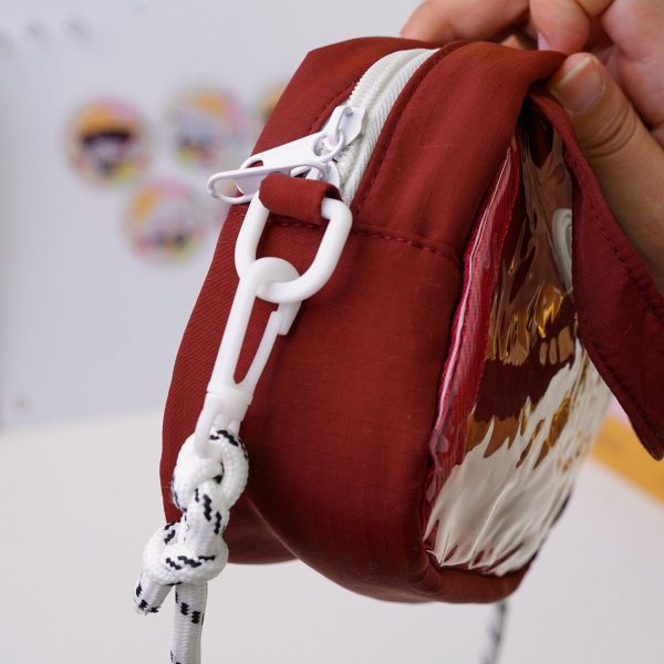 Red Kawaii Convertible Ita Bag with Clear Window for Plushies and Pins — ita bag detail view