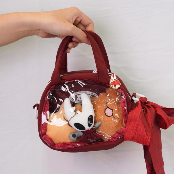 Red Kawaii Convertible Ita Bag with Clear Window for Plushies and Pins — ita bag detail view