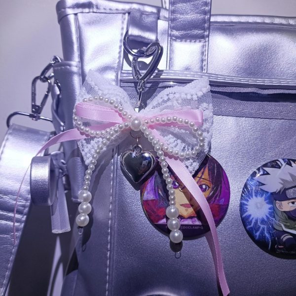 Silver Ita Crossbody Bag with Clear Window and Included Insert for Pin Display — crossbody ita bag detail view