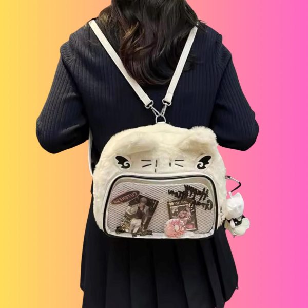 Small Black Convertible Ita Bag for Plushies and Pins — mini ita bag detail view