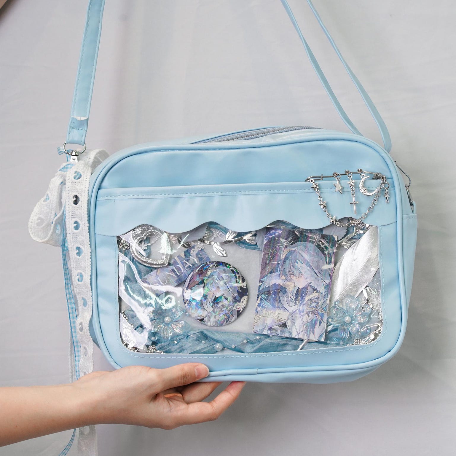 Small Black Convertible Ita Bag with Clear Window for Plushies and Pins Small Black Convertible Ita Bag with Clear Window for Plushies and Pins — mini ita bag detail view