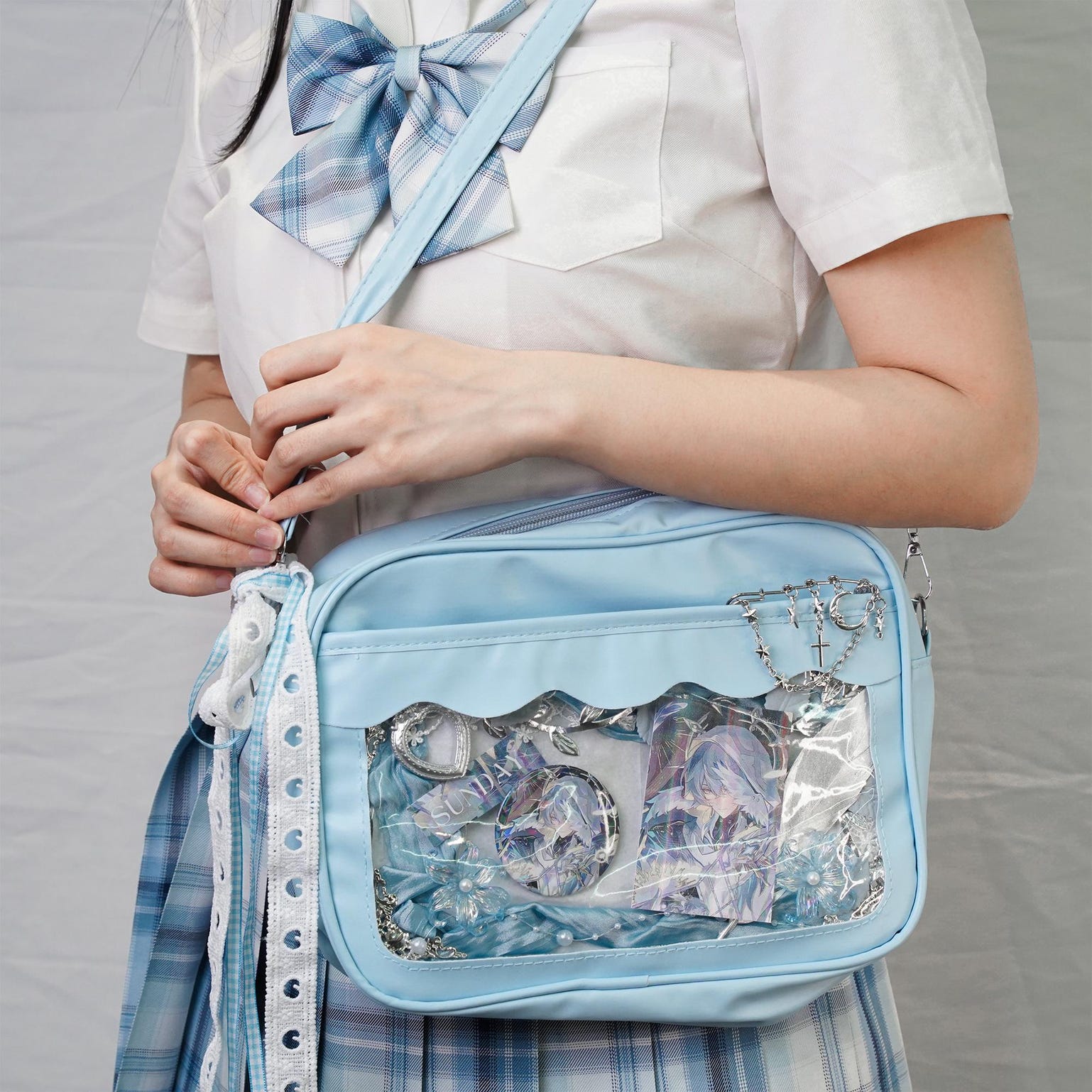 Small Black Convertible Ita Bag with Clear Window for Plushies and Pins Small Black Convertible Ita Bag with Clear Window for Plushies and Pins — mini ita bag detail view