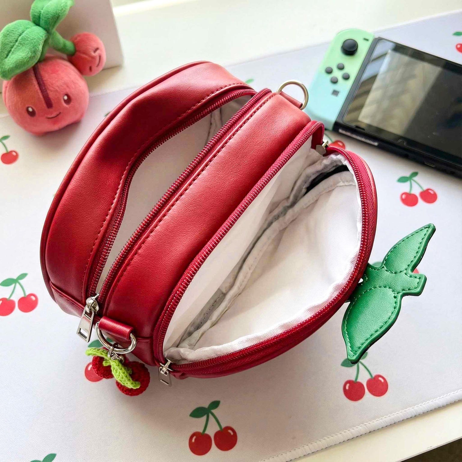 Small Red Cherry Ita Crossbody Bag with Clear Window for Plushies and Pins Small Red Cherry Ita Crossbody Bag with Clear Window for Plushies and Pins — crossbody ita bag detail view